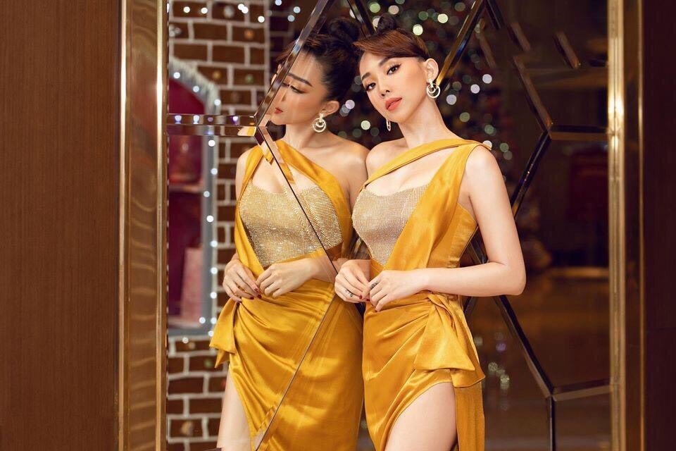 Đầm dạ hội dài dự tiệc thiết kế xẻ tà hở lưng màu vàng quyến rũ