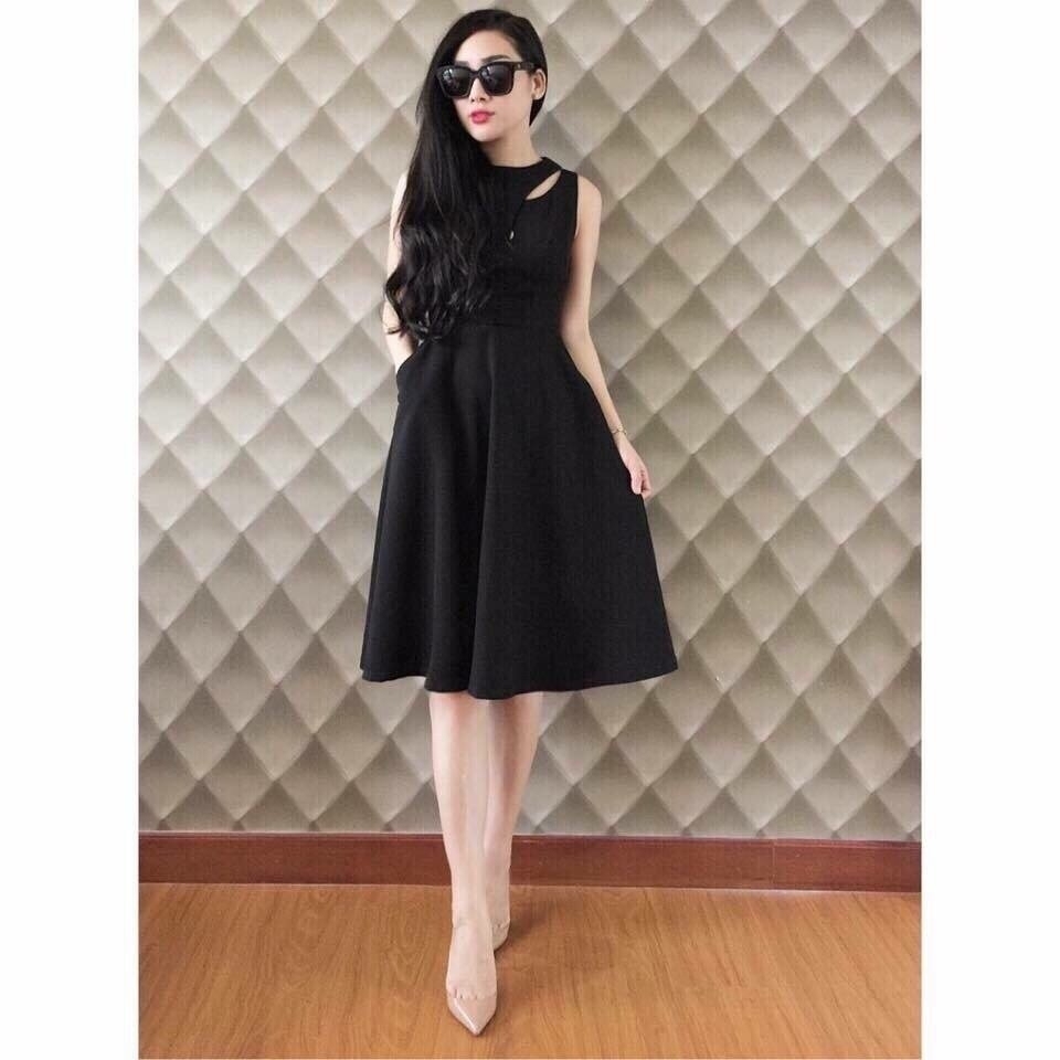 Đầm xòe cut out phối túi màu đen sành điệu